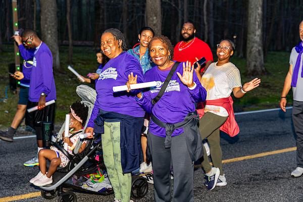 Group of people at the 2025 Glow Walk/Run for Autism Acceptance